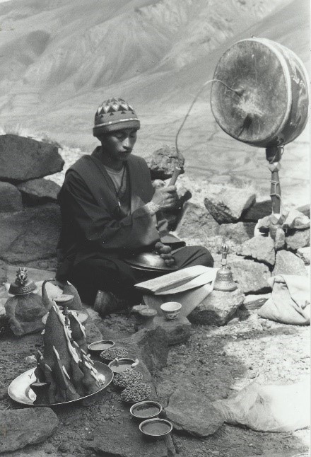 Lama with lha rnga in Ladakh
